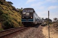 Train moves along tracks that run through San Clemente State Beach